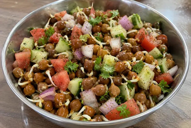 Sprout chana salad with onion, tomato, cucumber and coriander
