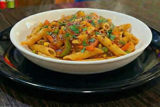 Spicy masala pasta in a bowl