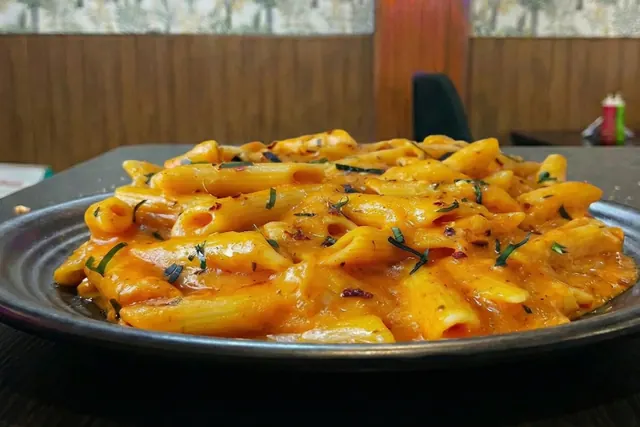 Mixed sauce penne pasta with a creamy red and white sauce