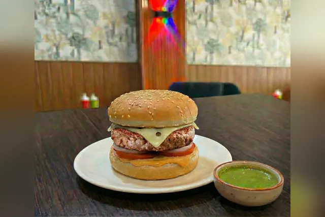 Cheese burst veg burger with melted cheese